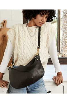 Style this woven leather statement as a shoulder bag or a crossbody thanks to its adjustable strap that connects with goldtone hardware on each end. Leather/cotton Imported Latinx Owned and Founded Everyday Bags With Brass Hardware For Fall, Chic Everyday Shoulder Bag With Brass Hardware, Chic Shoulder Bag With Brass Hardware For Everyday, Everyday Woven Leather Hobo Crossbody Bag, Woven Leather Crossbody Hobo Bag, Versatile Shoulder Bag With Brass Hardware For Everyday Use, Everyday Crossbody Hobo Bag With Brass Hardware, Everyday Fall Woven Leather Shoulder Bag, Everyday Woven Leather Shoulder Bag For Fall