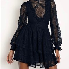 You Could Live Forever You Just Have To Pay The Price. This Intricate Black Lace Evokes A Feeling Of Bygone Eras, As Though It Could Have Been In Your Closet For Hundreds Of Years. Made From A Structured Lace Fabric Whimsical Gathered Full-Length Sleeves Ruffle Front Detail Flirty Tiered Skirt Partly Lined Bodice, Fully Lined Skirt Nwt Only Ever Tried On. Au Size 8 Lace Mini Evening Dresses, Elegant Mini Dress With Lace Patchwork, Elegant Black Dress With Lace Patchwork, Lace Mini Dress For Evening Occasions, Fitted Lace Patchwork Mini Dress, Lace Patchwork Evening Dress For Fall, Long Sleeve Dress With Lace Trim For Date Night, Lace Midi Dress With Ruffles For Night Out, Long Sleeve Dress With Lace Patchwork For Night Out