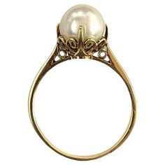 Elevate your style with this elegant 14K Yellow Gold Pearl Ring. Featuring a lustrous pearl measuring 8mm, this ring weighs 2.67 grams and is sized at 6.5. Perfectly combining sophistication with a touch of luxury, this ring is an exquisite addition to any jewelry collection. Material: 14K Yellow Gold Selling Price: $1099  A free online diamond appraisal is included upon request. Classic Luxury Gold Pearl Ring, Luxury Heirloom Pearl Ring For Gift, Luxury Oval Heirloom Pearl Ring, Luxury Yellow Gold Pearl Ring For Everyday, Gold Pearl Ring, Multi Gemstone Ring, Mikimoto Pearls, Pearl And Diamond Ring, Modern Engagement Rings