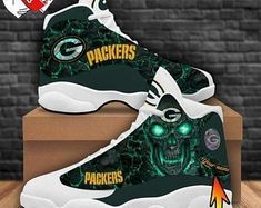 Green Bay Packers Air Green Bay Packers Shoes Green Bay Packers Des 16. Discover the perfect blend of nature and style with these sneakers adorned with a vibrant dinosaur print and floral patterns. Designed for comfort and flair, they're a bold choice for the fashion-forward individual. #Shoes #Snorider Green Bay Packers Shoes, Jordan 13 Shoes, Nfl Packers, Personalized Shoes, Expressive Fashion, Shoes Design, Jordan 13, Sport Sneakers, Green Bay Packers