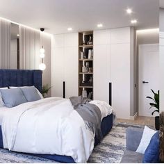 a bedroom with white walls and blue bedding