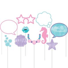 some pink and blue items are on top of each other with bubbles, seashells, and stars