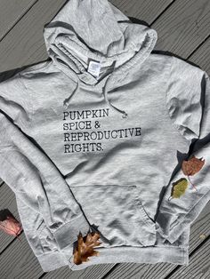 Pumpkin Spice & Reproductive Rights Sweatshirt. Fitted Organic Cotton Top For Fall, Organic Cotton Fall Hoodie Sweatshirt, Organic Cotton Hoodie Sweatshirt For Fall, Fitted Fall Sweatshirt With Adjustable Hood, Winter Organic Cotton Hoodie Sweatshirt, Organic Cotton Winter Hoodie Sweatshirt, Fitted Cotton Hoodie With Letter Print, Winter Hoodie Sweatshirt, Fitted Fall Hoodie With Adjustable Hood