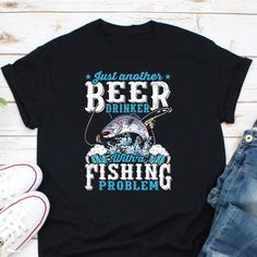 Just Another Beer Drinker With Fishing Problem Shirt, Gift For Fisherman, Fishing Hobby Shirt, Fishing Rod Shirt, Fishing Life Shirt Ordering Process for our valued customers ~ Please follow all steps to place an order. ~ Please select the hoodie type and size. ~ Please select color of the hoodie from drop down options. ~ If you want to purchase more than 1 , add current item to your cart and then you can click back, add more items for each product. ~ Once all your desired items , you can comple Gift For Fisherman, Beer Drinker, Fishing Life, Fishing T Shirts, Fishing Rod, Kid Tees, Shirt Price, Black Shirt, Hoodie Shirt