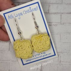 Ramen Earrings Noodles measure approximately between 1.5cm to 2.25cm Materials: ▫ Polymer Clay ▫ Hypoallergenic Hanging Earring Hook Each Ramen square is handmade by me, so you may receive a pair of earrings that are slightly different from the ones pictured in the listing. As they are all made by hand all are similar but no two pairs will ever be the same! I can also do custom orders. Please feel free to send me a message with any questions or ideas! Thanks for checking out my shop! Handmade Yellow Rectangular Earrings, Yellow Rectangular Earrings Gift, Yellow Rectangular Earrings As A Gift, Yellow Rectangular Earrings For Gifts, Rectangular Yellow Earrings For Gift, Handmade Square Earrings For Gift, Square Hypoallergenic Earrings For Gift, Hypoallergenic Square Earrings For Gifting, Hypoallergenic Square Earrings As Gift