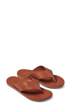 Wide straps carefully crafted from vegetable-tanned leather bring a modern look to this flip-flop set on a rubber sole with reliable traction. Arch support Leather upper and lining/leather and rubber sole Imported Wide Straps, Vegetable Tanned Leather, Flip Flop, Arch Support, Women's Shoes Sandals, Rubber Sole, Flip Flops, Shoes Sandals, Leather Upper