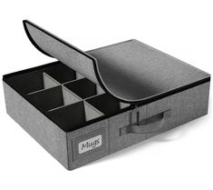 an open gray case with compartments on the bottom and inside, for storing small items