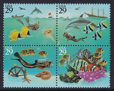 postage stamps depicting marine animals and fish on the ocean floor, with blue water in the background