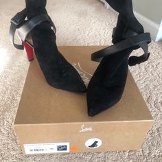 Black Suede Heels. Open Back 3 Inches. Excellent Condition. Barely Worn. Designer Suede Block Heel, Designer Suede Block Heels, Black Block Heels With Red Sole, Luxury Black Ankle Strap Boots, Luxury Heels With Stacked Heel, Designer Calf Leather Heels With Wrapped Heel, Black Calf Leather Heels With Heel Strap, Black Ankle Strap Heels In Calf Leather, Luxury Black Suede Heels