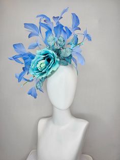 From the 2024 Featured Milliner of the Kentucky Derby Museum  Gorgeous Kentucky Derby hat fascinator  kentucky derby hat fascinator blue teal ombre rose with branching blue feathers and blue velvet leaves  headband attachment.  each hat is totally one of a kind! no two are alike! I can probably add feathers, flowers etc to existing hats for a small fee. I cannot remove anything from existing hats. Just message me and see if we can make it work! :) I cannot make custom order from scratch. My sche Blue Fascinator With Handmade Flowers For Kentucky Derby, Blue Headpieces For Kentucky Derby Races, Turquoise Headpiece For Kentucky Derby Races, Turquoise Headpieces For Kentucky Derby, Blue Feather Headpiece For Kentucky Derby, Blue Feather Fascinator For Kentucky Derby, Blue Feathered Headpiece For Kentucky Derby, Blue Feathered Fascinator For Kentucky Derby, Spring Blue Feathered Costume Hat