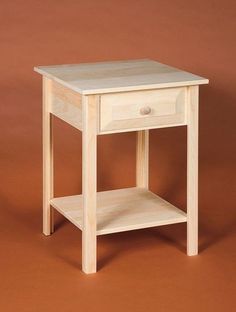 a small wooden table with one drawer on the top and two shelves below it, against a brown background