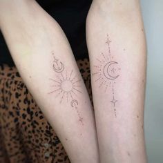 two women with matching tattoos on their arms, both have stars and moon tattoo designs