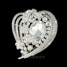 "PERFECT GIFT /WEDDING GIFT FOR BRIDE / BRIDESMAID / LADY! This stunning Huge Sparkling Heart brooch is completely covered with CLEAR SWAROVSKI crystals. Super sparkling! This sparkling pin measuring 2 1/8\" wide X 2 1/2\" high (55mm X 63mm). Great piece for your collection! Prices are in US$. For shipping policies and other important information, click on \"profile\" on the right. See an item that you like but has already been sold? Contact me to see if I have more! Thank you for stopping by Ka White Crystal Brooches For Wedding, White Crystal Wedding Brooches, Elegant Crystal-embellished Brooches For Weddings, Elegant Crystal-embellished Wedding Brooches, Elegant Crystal Embellished Brooches For Wedding, White Crystal Brooch For Anniversary, White Rhinestone Anniversary Brooches, Elegant Crystal Wedding Brooches, Elegant Wedding Crystal Brooches