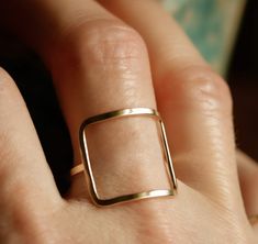 **PLEASE NOTE: This item is MADE TO ORDER. Current production times are listed in the announcement section of my shop's homepage. **Artist crafted. Original design made in Richmond, VA.** Hand fabricated, modern square ring. Organic form, crafted in solid sterling silver, 10k or 14k gold. Satin finish. Delicate and lightweight yet sturdy and super comfortable. **If unsure of your ring size, you can be easily measured at any local jewelry store. In the event that you order the wrong size, resizin Minimalist Rings Simple, Gold Cube, Gold Pinky Ring, 10k Gold Ring, Dainty Gold Rings, Square Ring, Bronze Ring, Solid Gold Ring, Geometric Ring