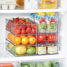 an open refrigerator filled with lots of different types of fruits and veggies in containers