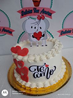 there is a cake with an elephant on top and hearts around the edges that say hello valentine's day