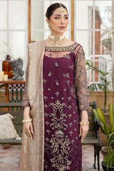 Beautiful Purple Luxury Salwar Kameez Trouser Womens Embellished Pakistani Party Dress with Golden Dupatta, a Traditional yet elegant Pakistani Salwar Kameez Suit in wonderful contrast of Purple and Golden Embellishment. Lavish Design, Threads, and hand-crafted details of ornaments make this beautiful Pakistani Party Wear an epitome of beauty and your priority for any festive or party occasion. Detailed Description: SKU: PB0125 Detailing: Embroidery, Threads, Floral designs Color: Purple Fabric: Net Kameez Designs, Party Wear Kurta With Dupatta For Reception, Eid Embellished Designer Salwar Kameez, Eid Embellished Salwar Kameez, Embellished Long Sleeve Salwar Kameez For Party, Unstitched Embellished Dress For Diwali, Festive Party Wear Embellished Kurta, Eid Embellished Designer Dress, Embellished Dress For Eid Designer Wear