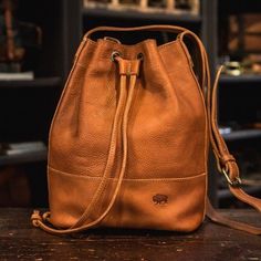 Madison Leather Bucket Bag - Saddle Tan Keep Private, Canvas Bucket Bag, Madison Brown, Bag Dark, The Madison, Striped Fabric, Leather Bucket Bag, Leather Bucket, Waxed Canvas