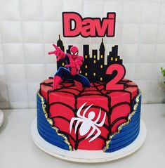 a spiderman birthday cake with the number two on it and an inscription that says davi