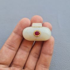 Oval shape amulate jade pendant studded with burmese ruby for necklace  This pendant is studded with Burmese Ruby with 24k Gold wire  This pendant were famous in Ottoman, Persian,Mughal empire. The piece has wear n tear, still in good condition. Dimension : 34 mm X 17 mm X 16 mm (approx) Many Thanks for visiting my Store! we will ship via FedEx or any other international courier company. If you have any questions regarding payment, shipping, or our policies, please do not hesitate to contact us.  Thank you for your interest in our auctions and we look forward to hearing from you. Note: Pictures are part of description, so view every image carefully for details. '' HAPPY BUYING'' Traditional Natural Gemstones As Gifts, Elegant Natural Ruby Gemstones, Elegant Gemstone Jewelry For Puja, Elegant Ruby Jewelry For Puja, Burmese Ruby, Mughal Empire, Note Pictures, Jade Pendant, Gold Wire