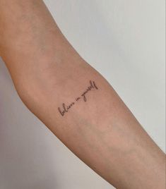 a person with a tattoo on their arm that says, you are my mom and me