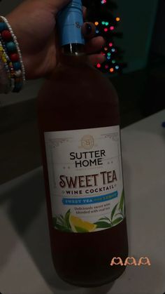 a bottle of sweet tea sitting on top of a table