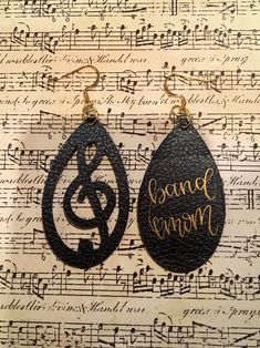 Band mom Faux Leather Earrings - music Earrings - teacher Earrings - Faux Leather Earrings - Teardrop Earrings - Drop Earrings by ncgalcreations on Etsy https://www.etsy.com/listing/709018570/band-mom-faux-leather-earrings-music Music Earrings, Pendulum Earrings, Teacher Earrings, Gold Ear Jacket, Diy Leather Earrings, 14k Gold Hoop Earrings, Band Mom, One Earring, Hammered Hoop Earrings