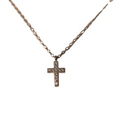 This dainty cross necklace is timeless in its simplicity. The certified 925 sterling silver setting is plated in 14k gold, or rhodium. Lining the cross in an intricate setting are sparkling stones, made of 100% simulated diamond material (AAA CZ). The chain is 16", and the cross is approximately 1/2” tall. This necklace is perfect for layering with other necklaces, so you can wear it every day. Shown in the pictures stacked with the opal triangle necklace, the Mama necklace; the eternity necklac White Gold Cross Necklace With Adjustable Chain, Dainty White Gold Cross Necklace, Dainty Cross Necklace, Mama Necklace, Gold Cross Necklace, Triangle Necklace, Everyday Necklace, The Cross, Rose Gold Plates