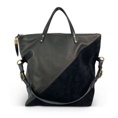 The Morleigh shape redefined. A tote, or a shoulder bag, the morleigh does great as an everyday bag. Half black suede, textured cowhide leather. An interior pocket is accompanied by cotton twill lining, solid brass hardware, and trimmed with our signature Kenyan horn toggle. Luxury Black Suede Bags, Modern Black Suede Bags, Black Suede Bag For Formal Occasions, Black Leather Bag With Suede Lining, Black Lizard, Bag Collection, Everyday Bag, The Door, Rebecca Minkoff Hobo