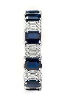 For Sale on 1stDibs - 18 Karat White Gold 5.26 Carat Emerald-Cut Sapphire and Diamond Eternity Band Ring This spectacular azure blue sapphire and invisible setting diamond band Blue Sapphire Right Hand Ring, Sapphire Wedding Band With Engagement Ring, Diamond And Sapphire Eternity Band, Blue Sapphire Eternity Ring, Diamond And Sapphire Band, Sapphire Baguette Band, Sapphire Ring Band, Elegant Blue Eternity Band With Vvs Clarity, Sapphire Eternity Band With Brilliant Cut