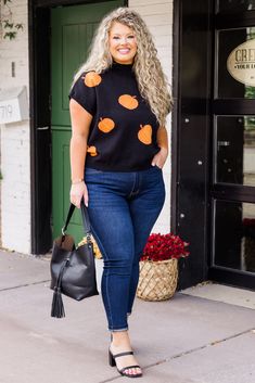 Celebrate the season in style with this vest in black! This unique piece features cap sleeves and a mock neck, as well as a playful knit pumpkin pattern! Perfect for pairing with your favorite denim and booties. Don't miss out on this must-have for any spooky season enthusiast! 68% Viscose, 23% PPT, 9% Nylon Halloween Sweater, Pumpkin Pattern, Sweater Black, Spooky Season, Mock Neck, Cap Sleeves, Unique Pieces, Must Haves, Halloween