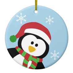 a penguin wearing a santa hat and scarf