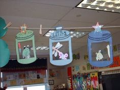 some paper lanterns hanging from the ceiling in a classroom