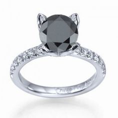 a black and white diamond engagement ring