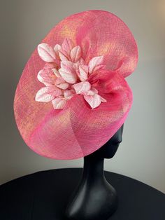 Stunning coral pink sinimay with gold threading hand-shaped into a beautiful saucer and accented with coral pink and white velvet leaves. Sits on a comfortable gold headband. Lightweight and easy to wear. Ships in a high quality storage box. One of a kind.  Perfect for Kentucky Derby, Royal Ascot, church, weddings, just for fun. Pink Flower Headpiece For Kentucky Derby, Adjustable Pink Hat For Ceremony, Pink Adjustable Hat For Ceremony, Pink Formal Fascinator With Pinched Crown, Pink Pinched Crown Fascinator For Formal Occasions, Pink Flower Fascinator For Races, Pink Summer Fascinator For Ceremony, Elegant Pink Fascinator For Ceremony, Pink Summer Ceremony Fascinator