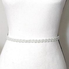 Transform your bridal look with our Beaded Pearl Belts, Ferzan, the ultimate accessory for sophistication and style. Delicately designed with 4 and 6-mm pearls, this stunning waist belt adds a touch of elegance and uniqueness to any wedding gown. Indulge in the luxurious luster and be inspired by its dainty beauty. DETAILS● Designed and handcrafted by ©JazzyAndGlitzy● The focus point measures in different lengths with plenty of ribbon on each side● Custom orders are welcome, or if matching piece Pearl Waist Belt, Pearl Belts, Pearl Ribbon, Pearl Belt, Focus Point, Bridal Attire, Wedding Belt, Wedding Sash, Beaded Wedding