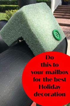 a mailbox with a green hat on it and the words do this to your mailbox for the best holiday decoration