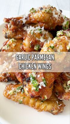 garlic parmesan chicken wings on a white plate with text overlay that reads garlic parmesan chicken wings