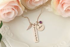 "This simple and elegant, yet truly stunning memorial necklace features a hypoallergenic stainless steel bar engraved with \"forever in my heart\" as well as a 5/8 Inch disc with the name of your loved one (and date if you choose that option from the dropdown menu). This piece is then finished with a detailed angel wing accent charm and a sparkling Swarovski crystal birthstone charm. Each pieces is handmade, right here in my studio. Gift wrapping available at checkout for an added fee. Marking y Elegant Hand Stamped Memorial Necklaces, Elegant Memorial Hand Stamped Necklaces, Elegant Memorial Hand-stamped Necklaces, Elegant Laser Engraved Necklaces For Keepsake, Hand Stamped Ring, Essential Oil Necklaces, Remembrance Jewelry, Forever In My Heart, Custom Memorial