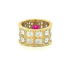 This spectacular ruby and diamond band has all the hallmarks of a timeless piece of heirloom jewelry. Made in Italy of 18k yellow and white gold, this ring features a fine-quality Burmese ruby weighing 1.68 carats, set in a beautifully detailed 18k yellow gold bezel. The ruby has intense color and exceptional brilliance, which is highlighted by the intricate, masterful gold craftsmanship and the striking combination of brilliantly engraved white and yellow gold. This ring has a wide band and can Antique Yellow Gold Ruby Ring With Filigree, Collectible Hallmarked Ruby Ring In Yellow Gold, Ornate Yellow Gold Hallmarked Ruby Ring, Ornate Ruby Jewelry In Yellow Gold, Antique 14k Gold Ruby Ring With Multi-stone, Burmese Ruby, Heirlooms Jewelry, Wide Band Rings, Ruby Diamond