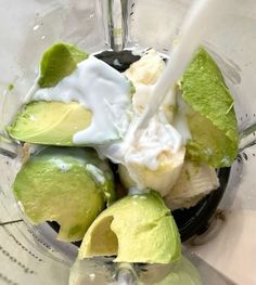 an avocado and yogurt mixture in a blender