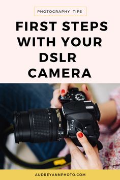 a woman holding a camera with the words, first steps with your dslr camera