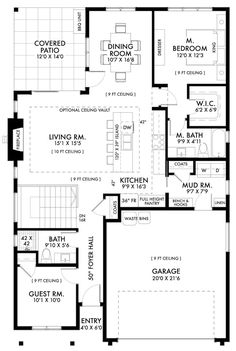 the floor plan for a two story house with an attached garage and living room area