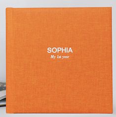 an orange book with the words sophia written on it