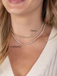 Our Graduated CZ Tennis Necklace is the perfect blend of elegance and affordability, designed for those who want to shine without the splurge. Made of gold fill with sparkling cubic zirconia stones, it features an adjustable chain for the ideal fit. This timeless piece adds the perfect touch of bling to any outfit, perfect for everyday wear or special occasions. Cubic Zirconia Clavicle Chain Tennis Necklace As Gift, Gift Yellow Gold Tennis Necklace With Sparkling Stones, Classic Yellow Gold Cubic Zirconia Tennis Necklace, Gift Cubic Zirconia Tennis Choker Necklace, Classic Gemstone Tennis Necklace - Gift, Tennis Jewelry, Diamond Tennis Necklace, Tennis Necklace, Initial Jewelry