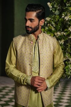 Sap green kurta with embroidered placket and cuffs. Paired with a churidar and mughal printed bundi. - Aza Fashions Green Sets For Groom On Eid, Green Sets For Groom For Eid, Festive Green Sherwani With Embroidered Border, Festive Green Traditional Wear For Groom, Festive Green Traditional Groom Wear, Green Cutdana Nehru Jacket For Diwali, Green Traditional Wear For Groom, Diwali Green Nehru Jacket With Cutdana, Green Embroidered Sherwani For Festivals