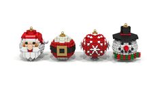 christmas ornaments made out of legos are shown in this image, including santa and mrs claus