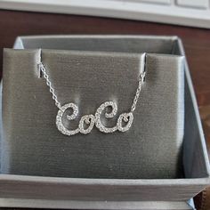 ★★★★★ "Just gorgeous name necklace and great communication! Will buy again!! Staci" ~ stacistephens . . #etsyreviews #personalizednecklace #finejewellery #finejewelry #initialnecklace #jewelgram #jewellery #jewellerydesign #jewellerydesigner #jewellerylover #jewelry Anniversary Diamond Name Necklace, Anniversary White Gold Name Necklace With Diamond Accents, Anniversary White Gold Name Necklace With Diamonds, Personalized Sterling Silver Diamond Necklace For Wedding, Wedding Name Necklace In White Gold With Diamonds, Anniversary Name Necklace With Diamond Accents, Anniversary Diamond Nameplate Necklace, Elegant Name Necklace With Hallmark For Anniversary, Custom Silver Necklace With Diamond Accents For Anniversary