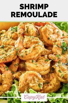 shrimp remoulade in a bowl with lettuce and lemon wedges