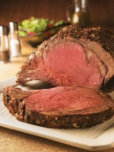 a piece of roast beef on a plate